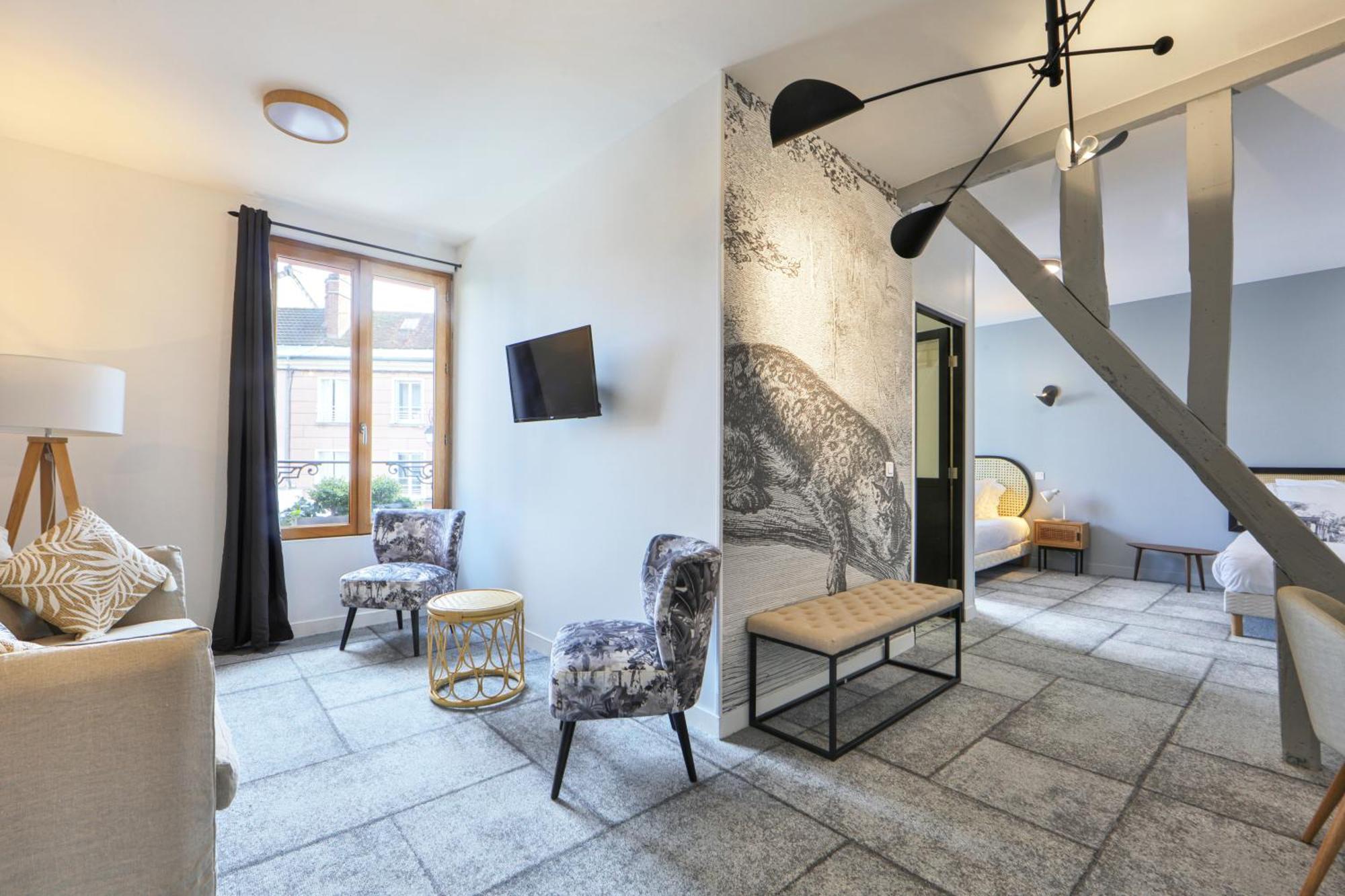 Logis Hotel & Restaurant Du Sauvage La Ferte-Gaucher Номер фото